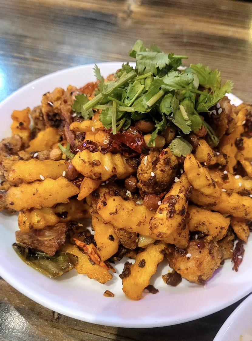 Fried mala wings with crinkle cuts