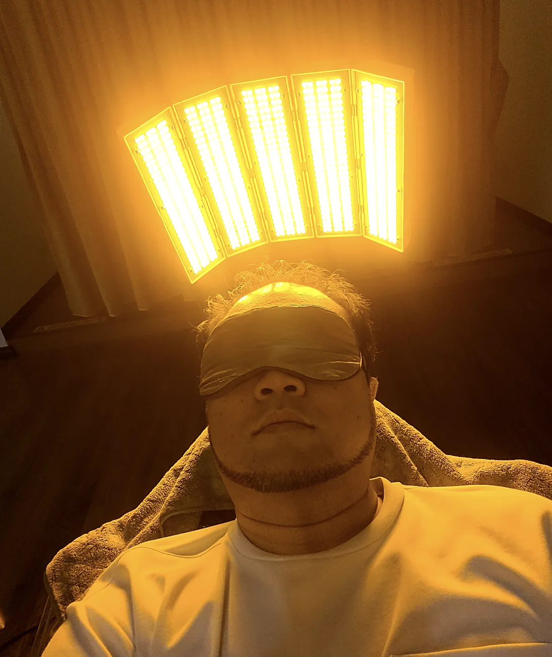 Under the red light therapy panel